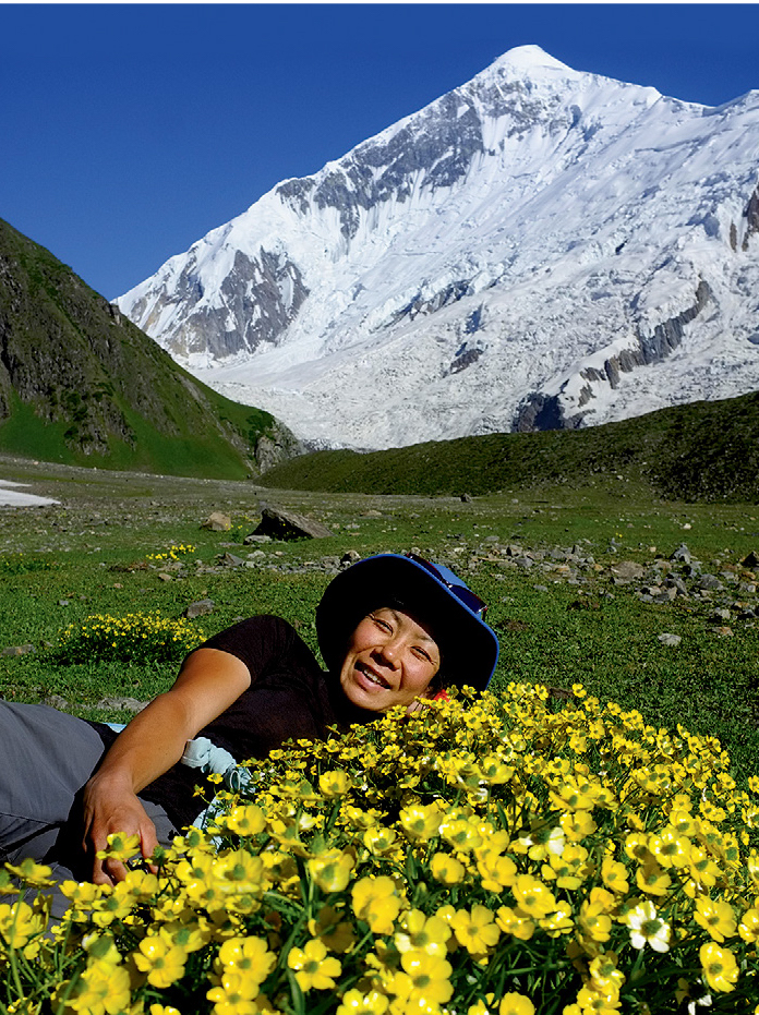 Taniguchi at the base of Diran Peak (7257m), which she and Kazuya Hiraide climbed in 2013 to acclimatize for their attempt on Shispare (7611m), Karakoram, Pakistan. [Photo] Kazuya Hiraide