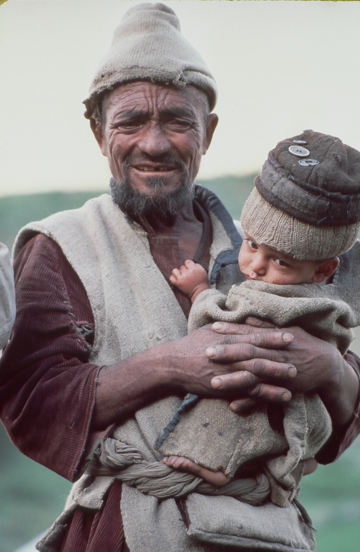 Unknown man with child. [Photo] Photographer unknown, Kim Schmitz collection