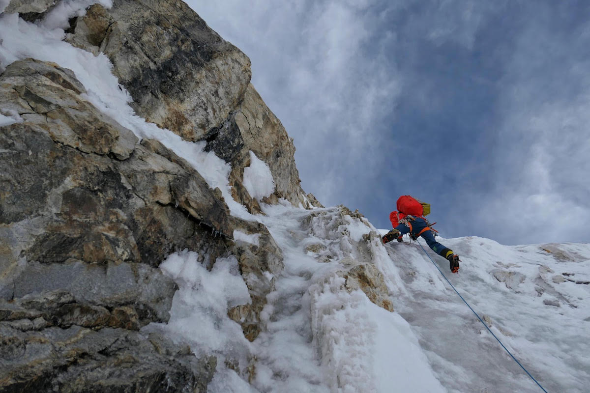 Tom Livingstone leading on Latok I during his successful ascent from the north side in which he and Ales Cesen and Luka Strazar climbed three-quarters of the North Ridge before traversing right to reach the south face where they continued to the top. [Photo] Ales Cesen/Luka Strazar