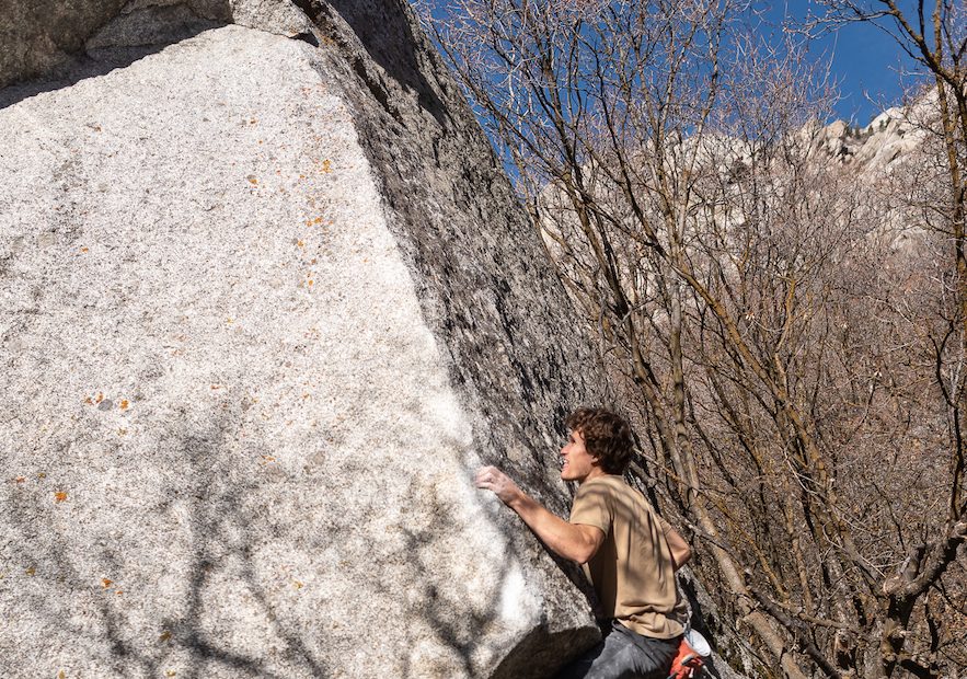 Olympic silver medalist Nathaniel Coleman climbs Wrist Rocket (V9), his favorite route in Little Cottonwood Canyon, which would be impacted by the proposed tram or expanded bus lanes that are being considered by the Utah Department of Transportation as preferred alternatives for future transit in the narrow canyon. [Photo] Tim Behuniak