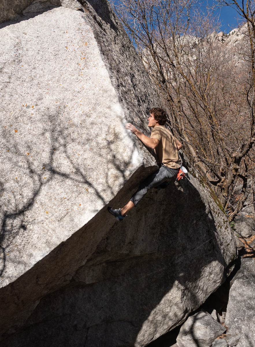Olympic silver medalist Nathaniel Coleman climbs Wrist Rocket (V9), his favorite route in Little Cottonwood Canyon, which would be impacted by the proposed tram or expanded bus lanes that are being considered by the Utah Department of Transportation as preferred alternatives for future transit in the narrow canyon. [Photo] Tim Behuniak