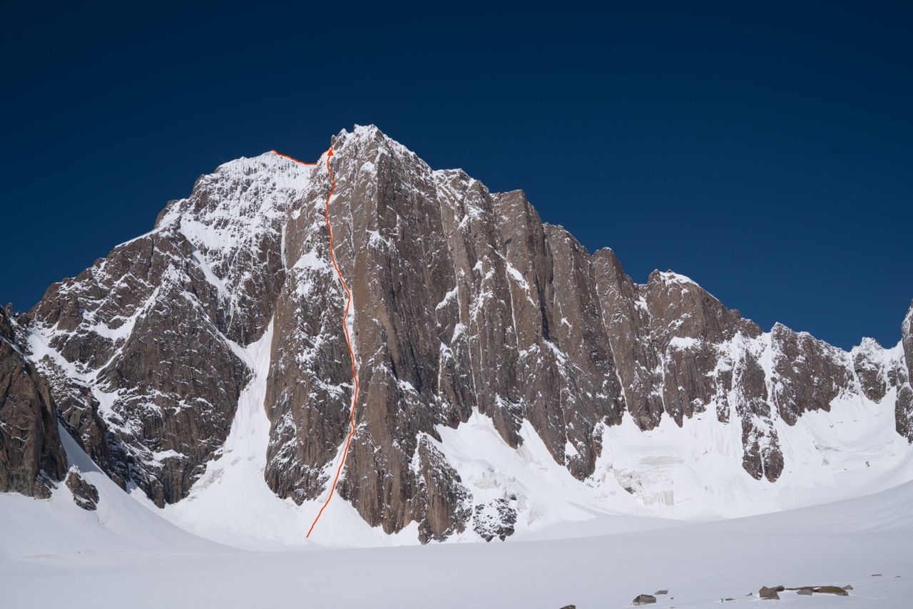 This photo of the southeast face of Kyzyl Asker (5842m) shows Ines Papert and Luka Lindic's new route, Lost in China (ED WI5+ M6, 1200m), in red. [Photo] Ines Papert and Luka Lindic