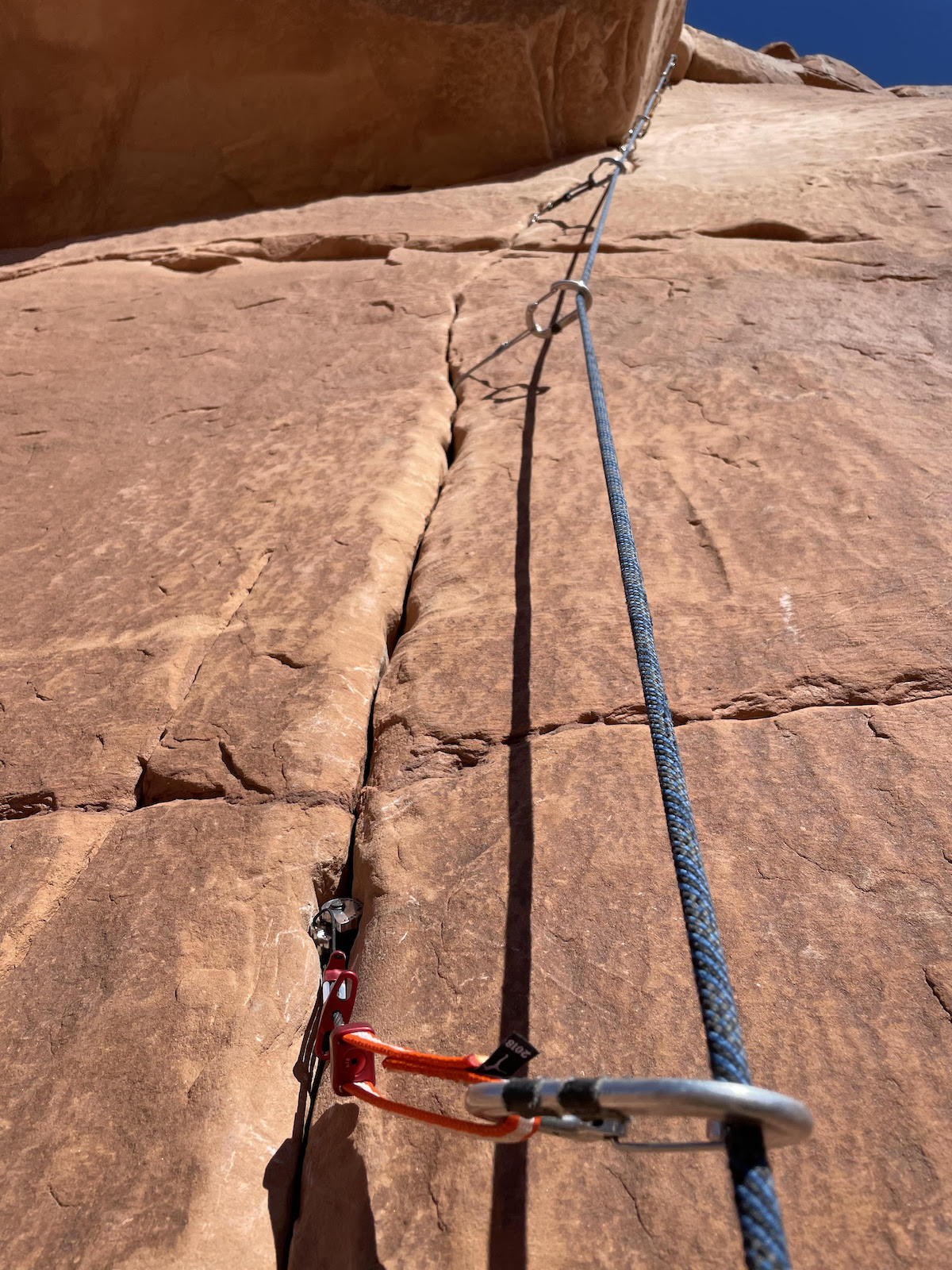 The #3/4 (orange/red) Metolius Ultralight Offset Master Cam was the author's very first placement on the first pitch of Zenyatta Entrada. [Photo] Derek Franz