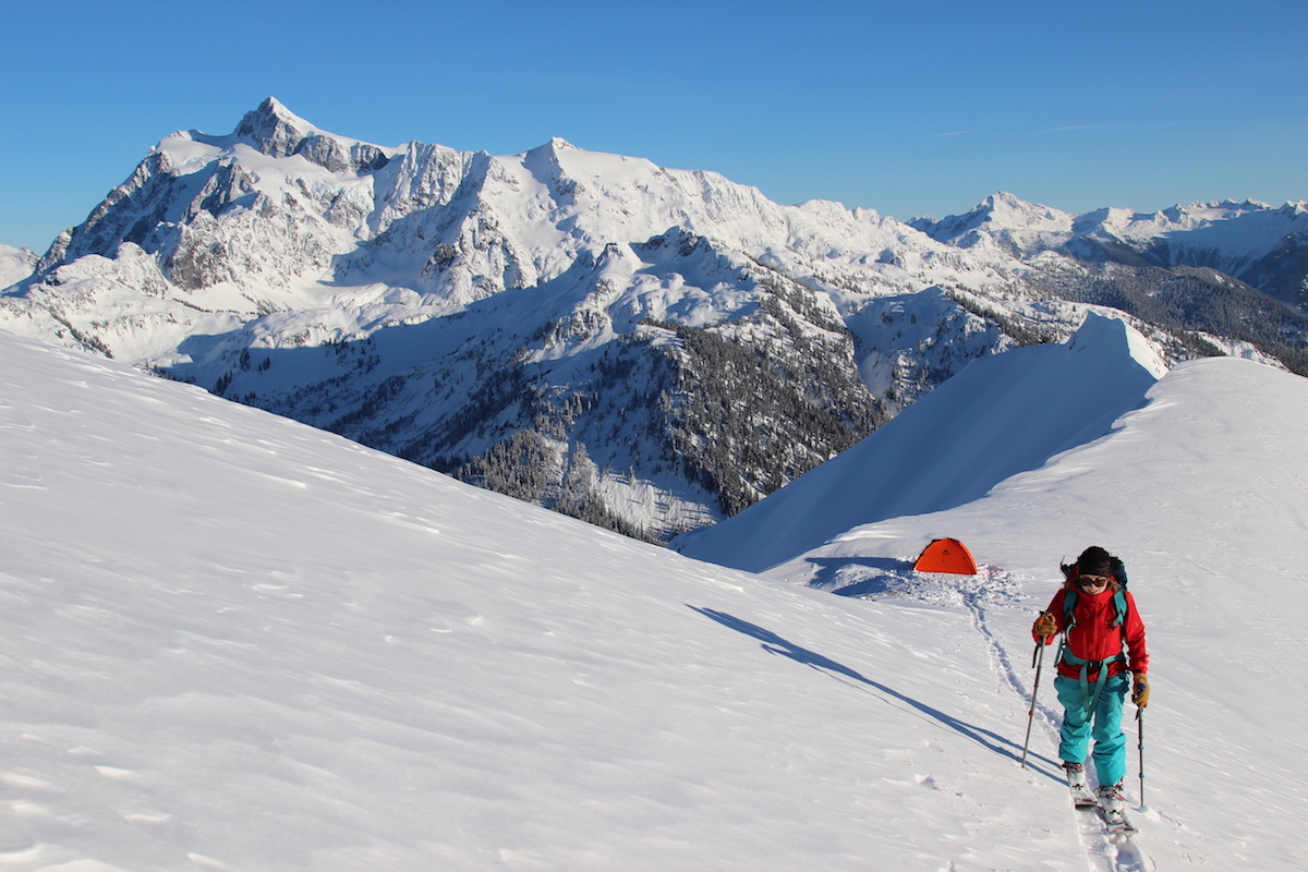 Skinning on Ptarmigan Ridge with Mt. Shuksan and Mt. Baker in the background. [Photo] Tim Black