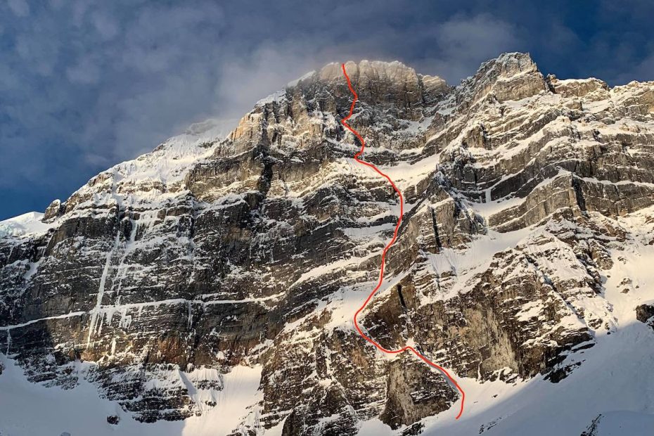 The east face of Mt. Fay with the line of The Sound of Silence (M8 WI5, 1100m) marked in red. [Photo] Courtesy of Ines Papert, Luka Lindic and Brette Harrington