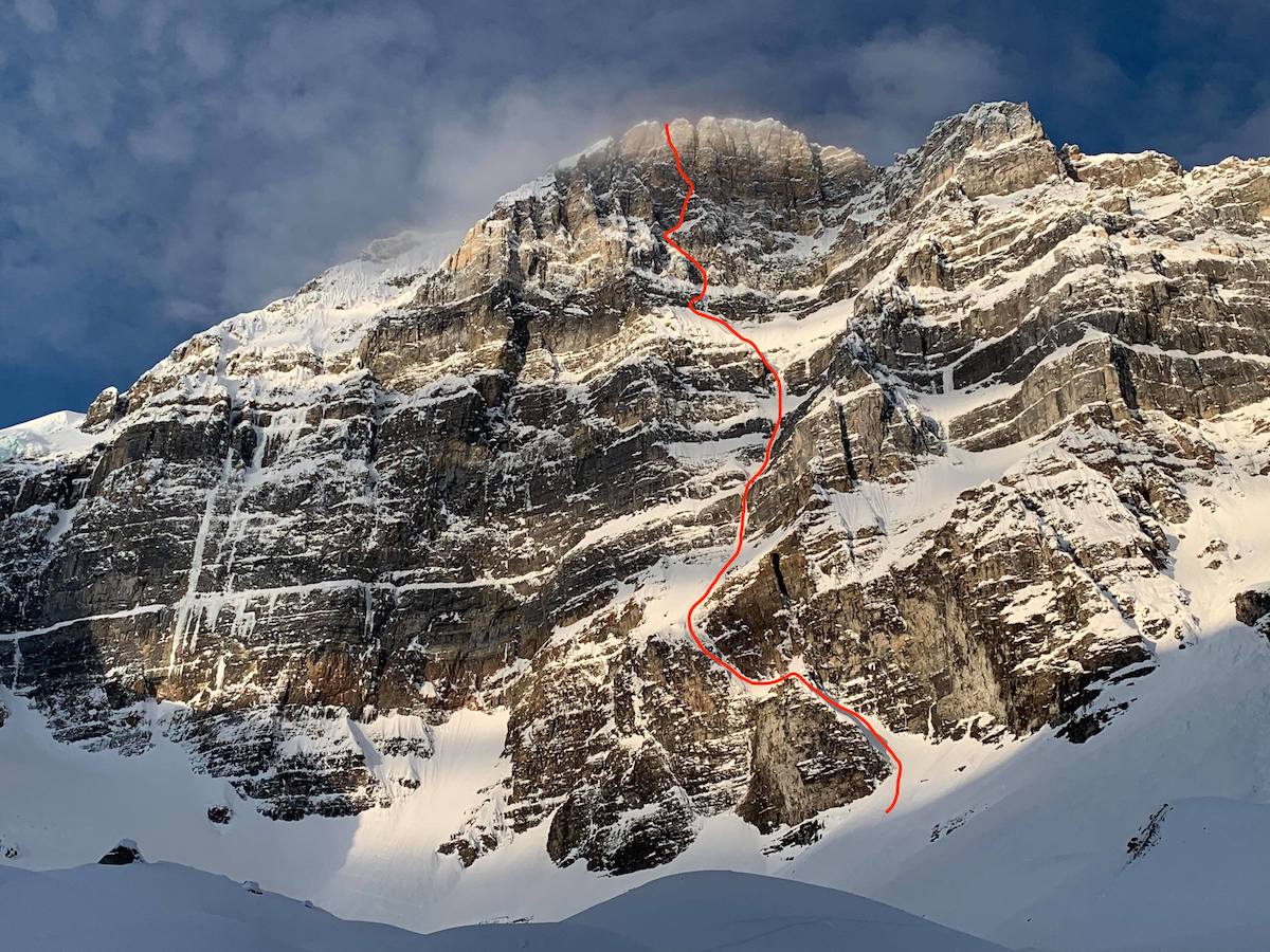 The east face of Mt. Fay with the line of The Sound of Silence (M8 WI5, 1100m) marked in red. [Photo] Courtesy of Ines Papert, Luka Lindic and Brette Harrington