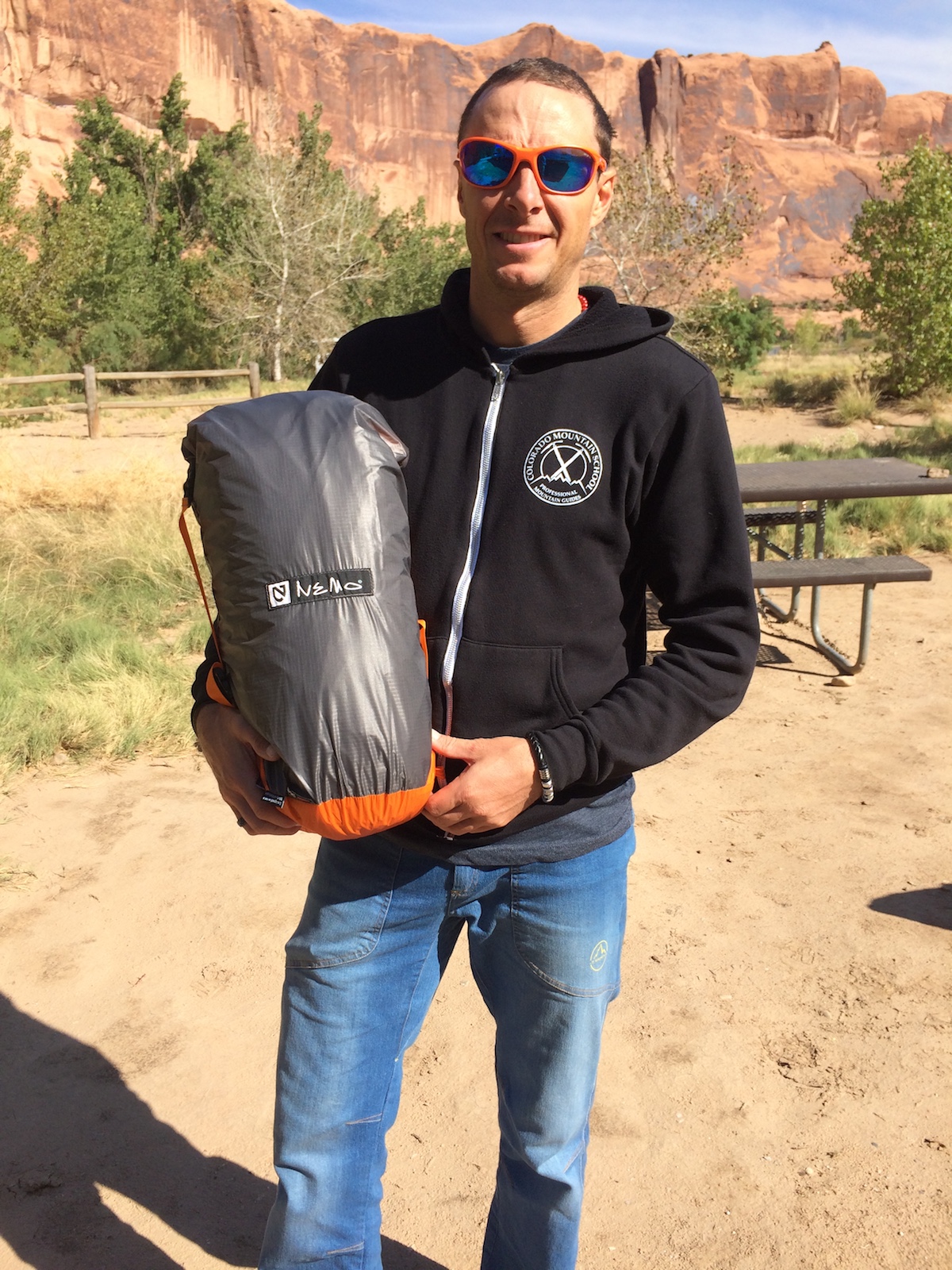 Mike Lewis holds the Nemo Chogori 3-person Mountaineering tent in its compression stuff sack. [Photo] Chris Wood