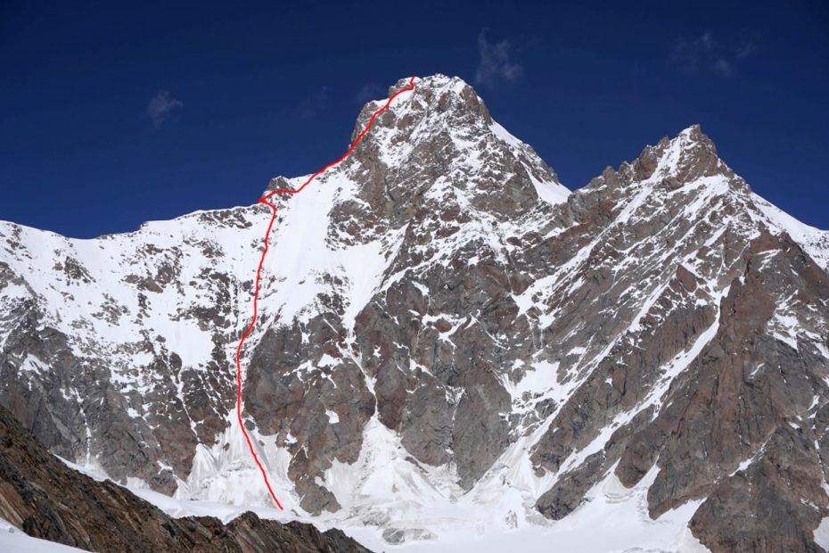 The South Face of Brammah II (6425) with Chris Gibisch and Jeff Shapiro's route, Pneuma (VI AI4, M5, 1300m), and bivy site are marked in red. [Photo] Chris Gibisch