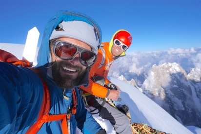 Jeff Shapiro and Chris Gibisch enjoying last light on the summit of Brammah II. [Photo] Jeff Shapiro