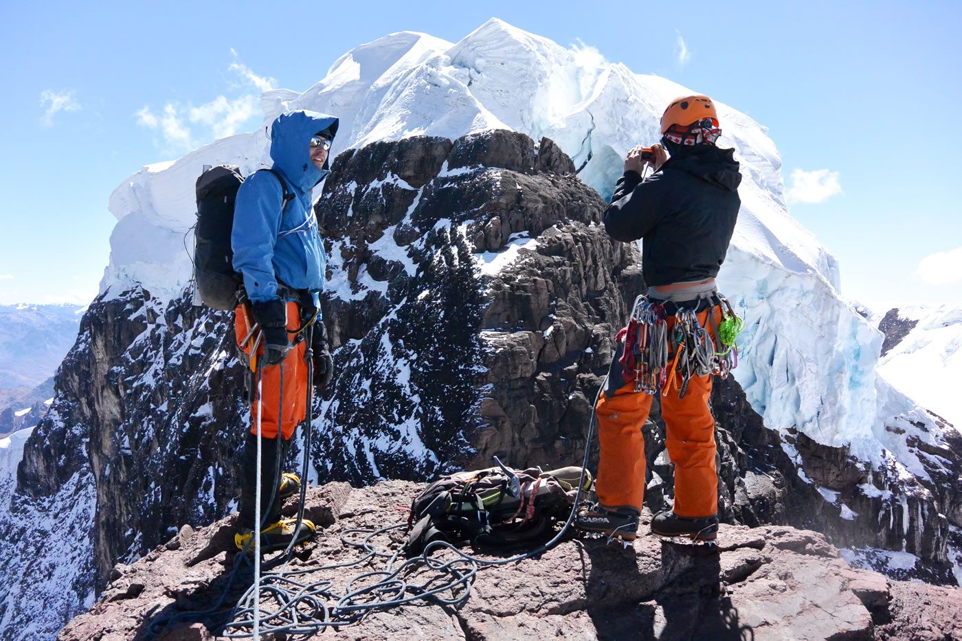 Field and Zimmerman gaze at Allincapac (5780) from the summit of Pico Carol. [Photo] Nathan Heald