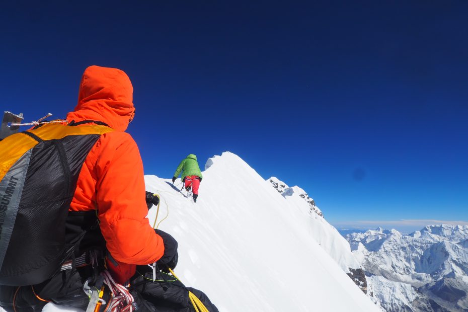 Helias Millerioux, Benjamin Guigonnet, Frederic Degoulet on the summit ridge of Nuptse, en route to completing the first ascent of the South Face (WI6 M5+, 2200m). The climb was selected for a Piolet d'Or.