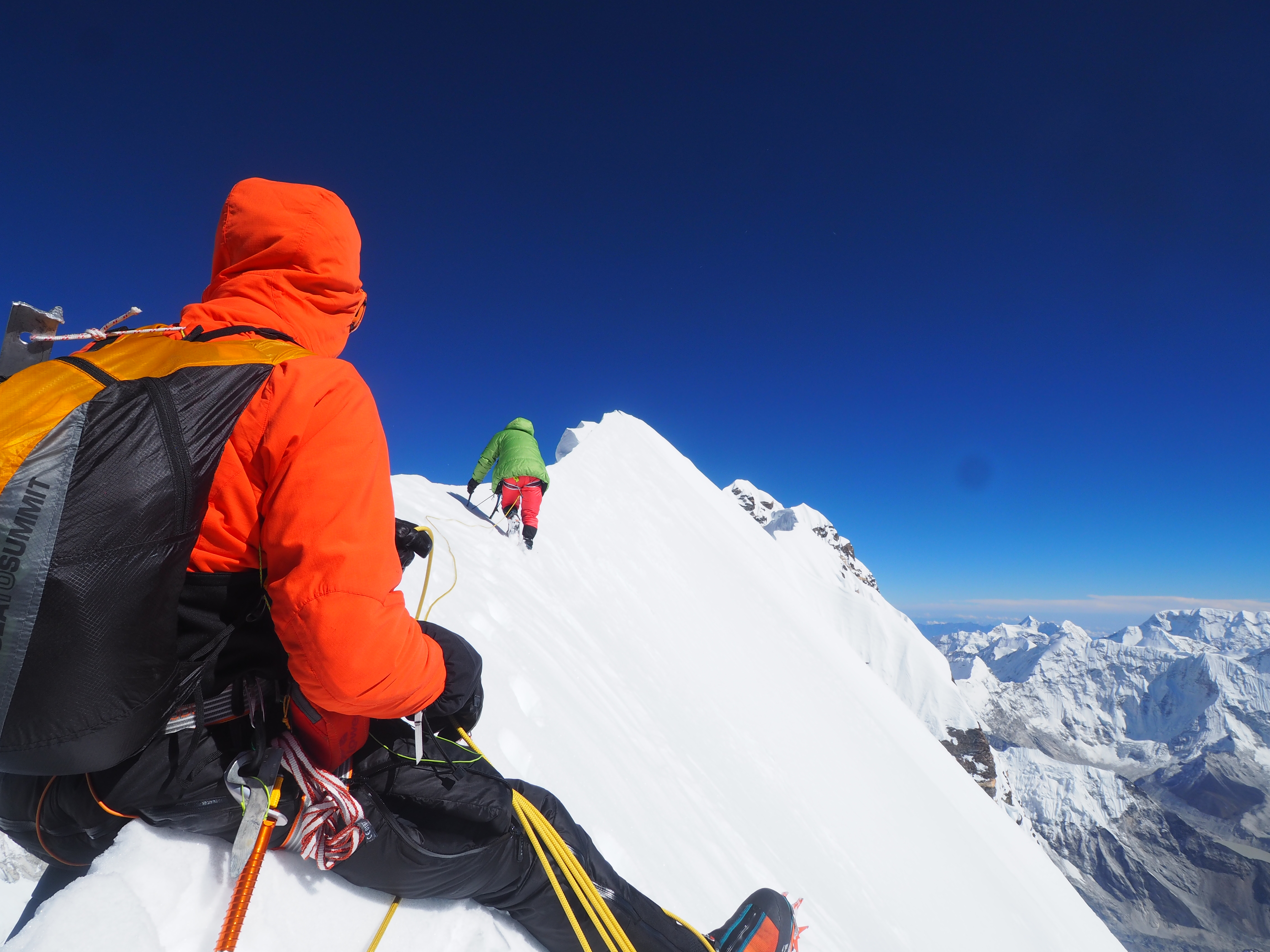 Helias Millerioux, Benjamin Guigonnet, Frederic Degoulet on the summit ridge of Nuptse, en route to completing the first ascent of the South Face (WI6 M5+, 2200m). The climb was selected for a Piolet d'Or.