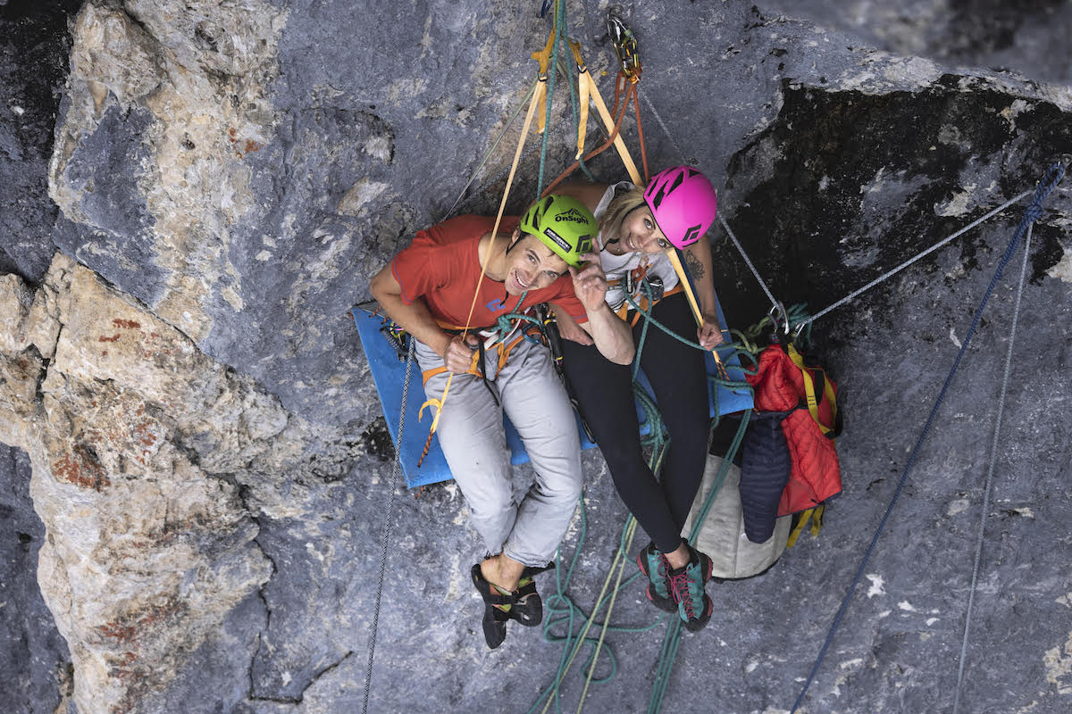 Schranz resting on a portaledge with Michaela Koller, who belayed him on the free ascent. [Photo] Johannes Mair / Alpsolut Pictures