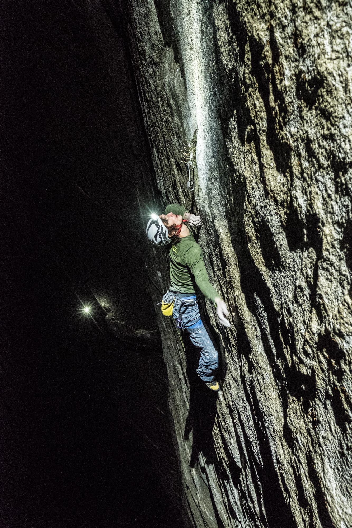 Ondra climbs Pitch 21 (5.13d) by headlamp. [Photo] Heinz Zak and Black Diamond Equipment