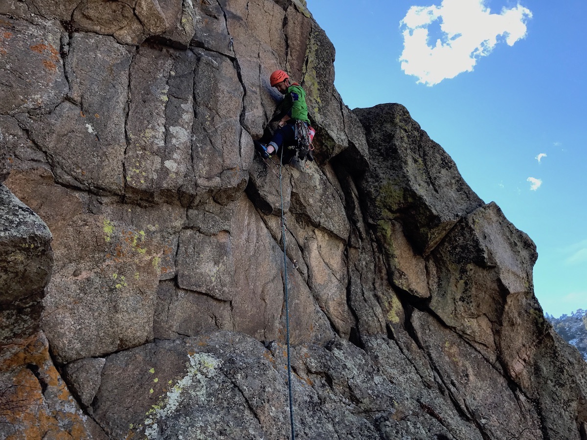 Chris Van Leuven leads FM (5.11c) in Boulder Canyon, Colorado, while wearing the Ortovox Merino Fleece Light Hoody. [Photo] Paul Gagner