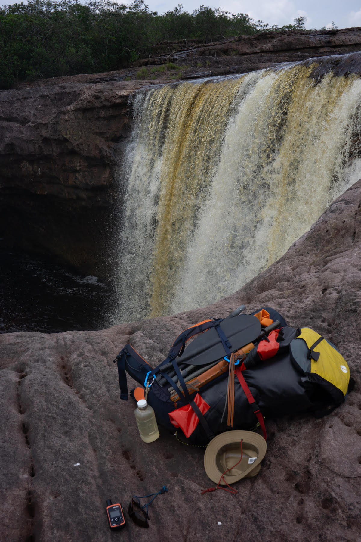 The external straps and daisy chains on the Mutant pack allowed it to carry paddles, machete, and a rolled-up two person pack-raft in the Colombian Amazon. [Photo] Drew Thayer
