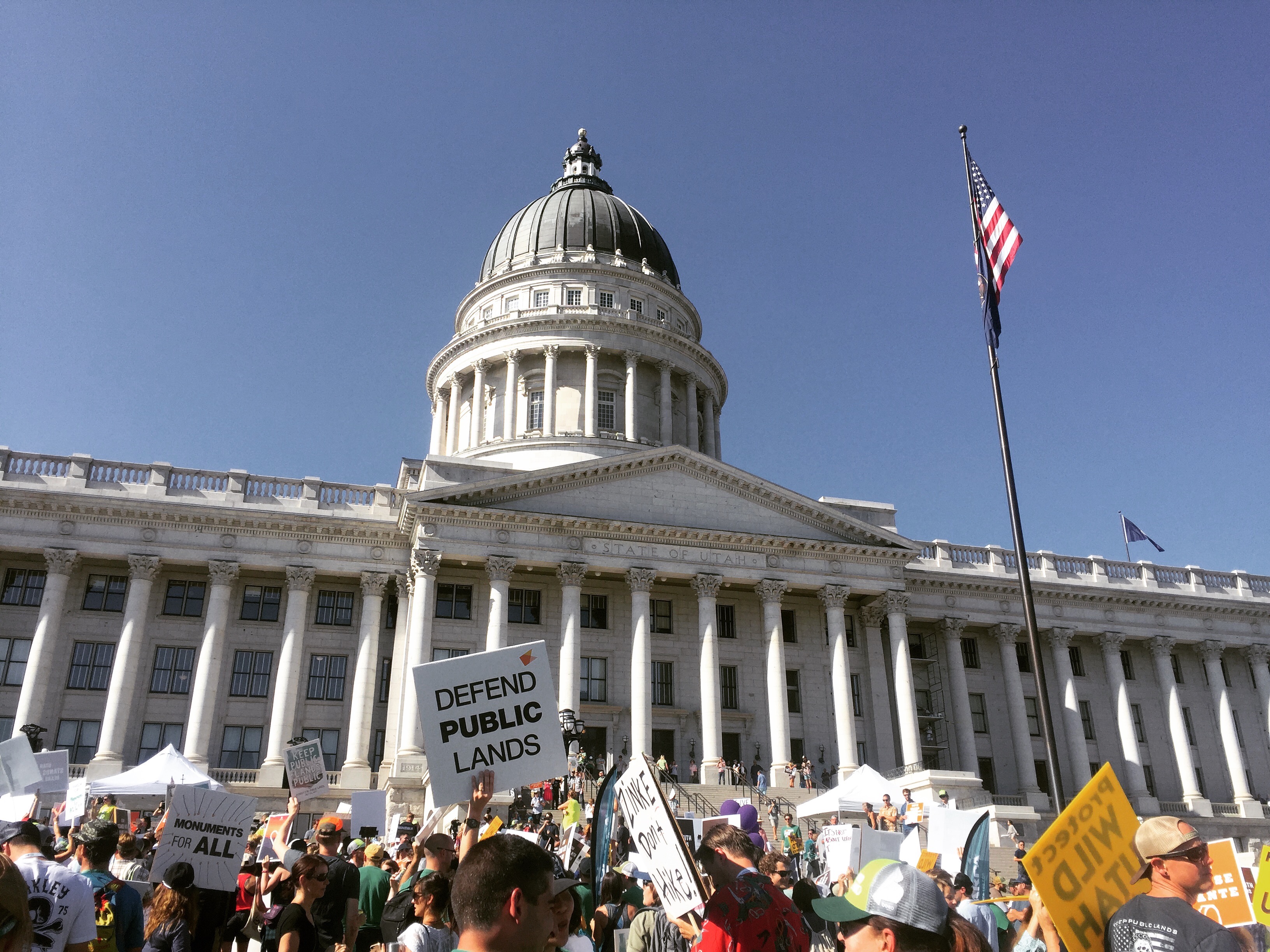 The This Land is Our Land March for Public Lands congregated in front of the Utah capitol in Salt Lake City on July 27 in conjunction with the last Outdoor Retailer Summer Market trade show to be hosted by the city. OR recently agreed to move the trade show to Denver starting next year in response to Utah lawmakers' continued efforts to rescind Bears Ears and Grand Staircase Escalante National Monuments. [Photo] Emma Murray