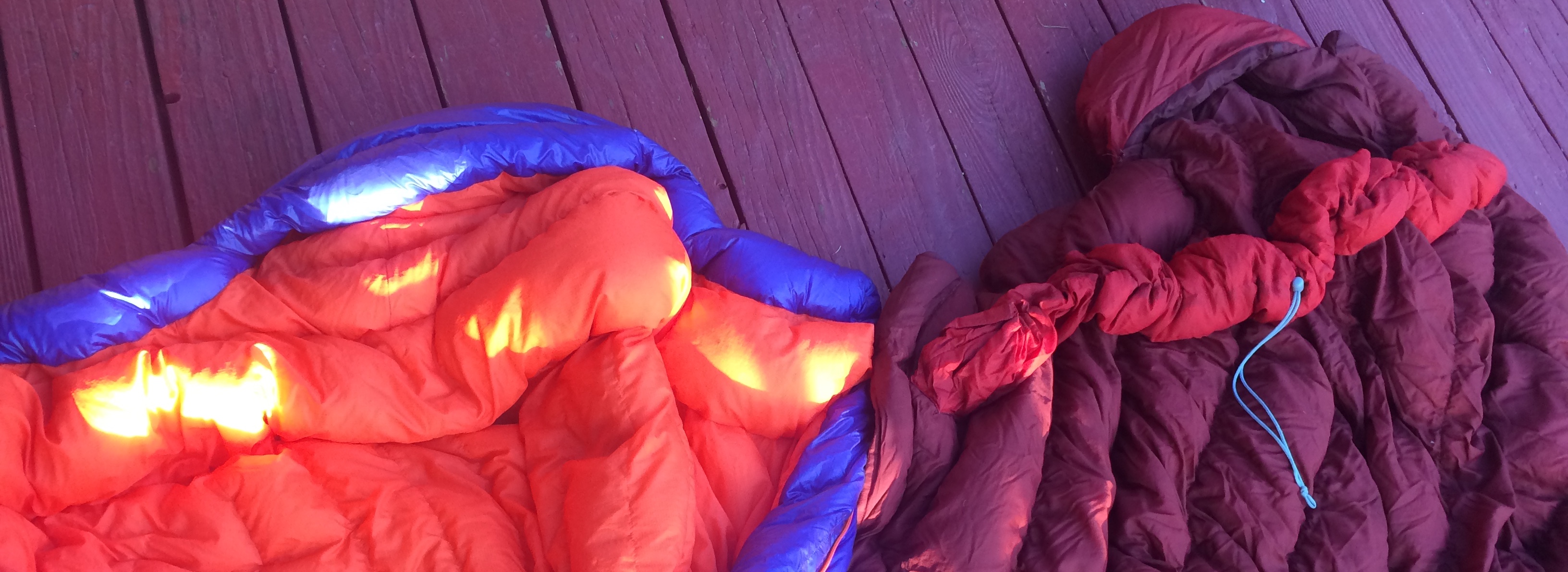 The Patagonia 19-degree bag (left) has a non-cinchable baffle at the neck level, while the Montbell Down Hugger zero-degree bag (right) has a cinchable neck. The sleeping bags in the 15- to 20-degree range typically do not have cinchable necks, and this is where warm air can escape and cold air can enter. [Photo] Mike Lewis collection