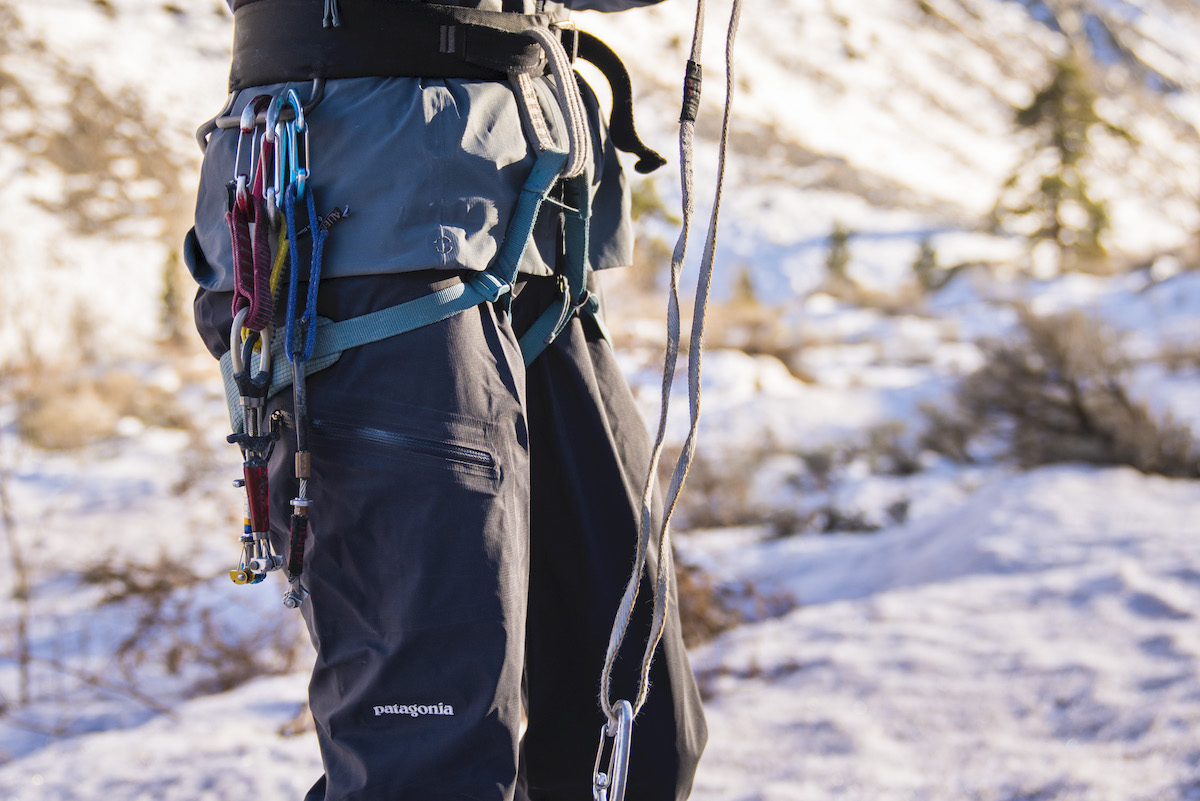 The Dual Aspect jacket is long enough to fit snugly underneath a harness, eliminating any major bunching while climbing.
