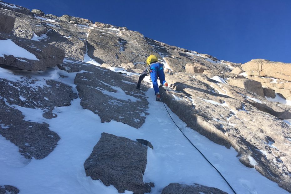 Mike Lewis guides the North Face of Longs Peak (14,259'), Rocky Mountain National Park, in mixed conditions. [Photo] Eric Stoutenburg