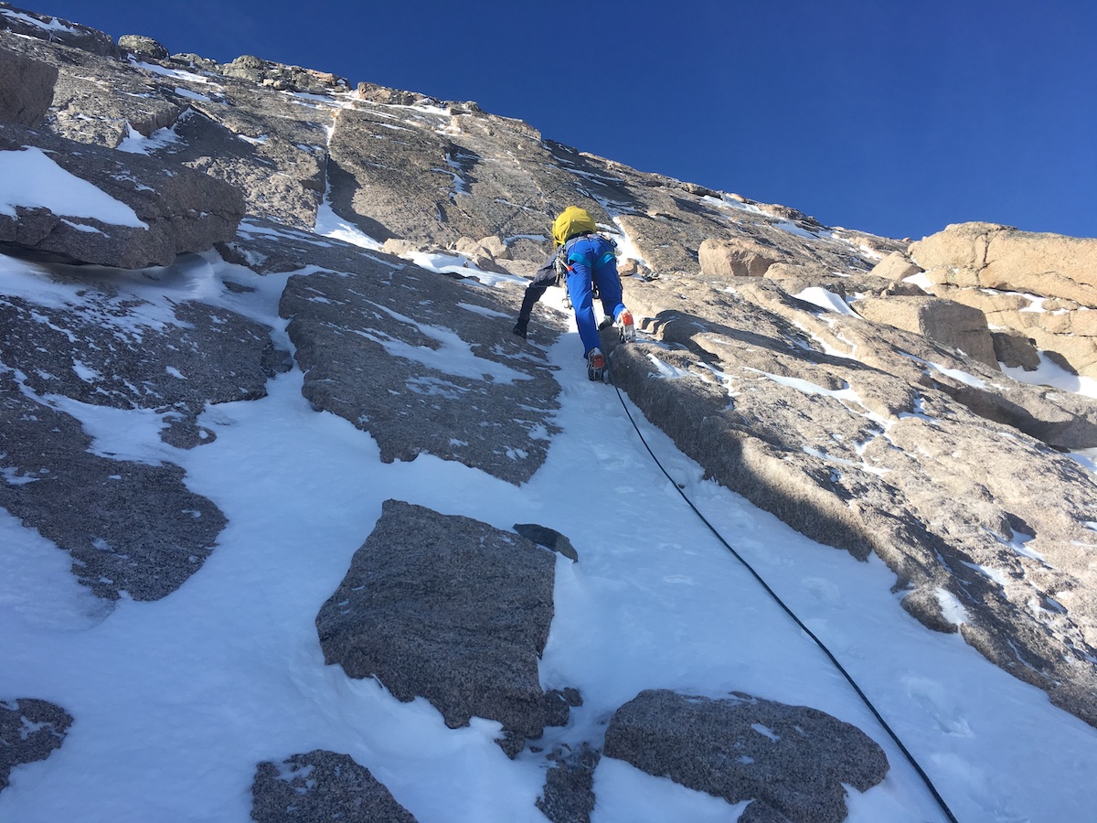 Mike Lewis guides the North Face of Longs Peak (14,259'), Rocky Mountain National Park, in mixed conditions. [Photo] Eric Stoutenburg