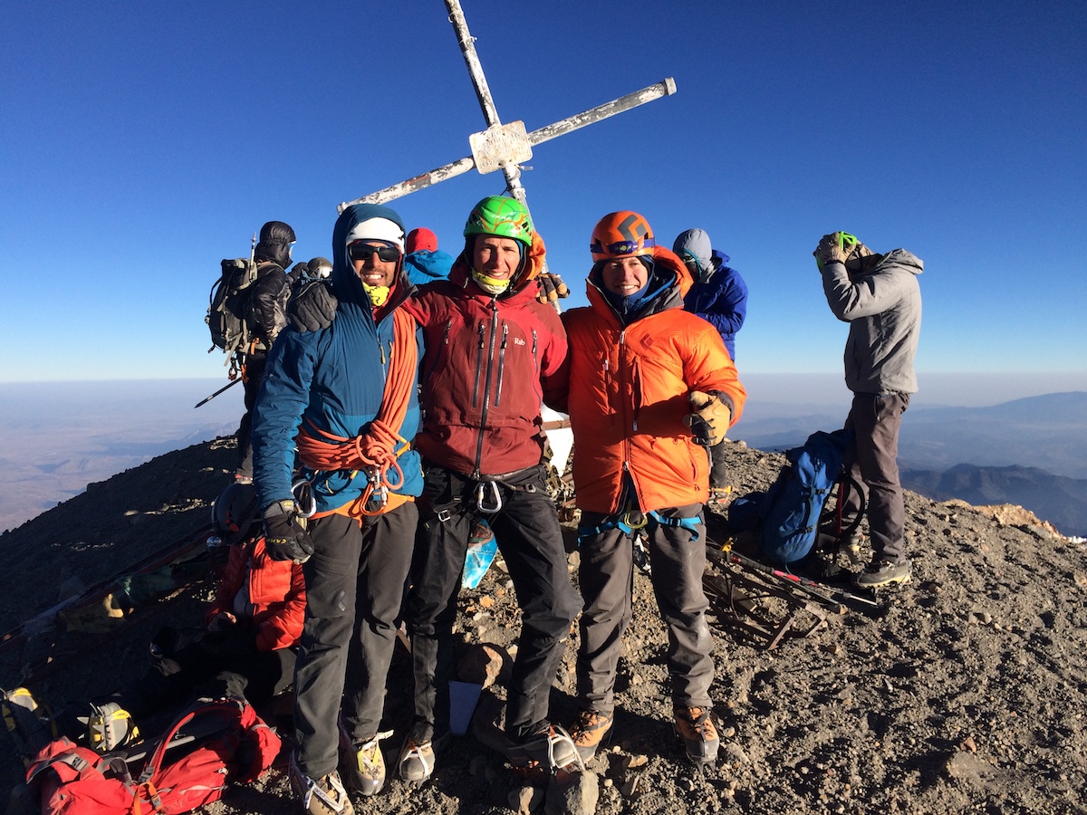 The author (middle) stands with fellow Colorado Mountain School guides Japhy Dunghana (left) and Bernardo Beteta (right) on the summit of Pico de Orizaba (18,491'). Mike wore the Petzl Irvis Hybrids for the glaciated section of the climb. [Photo] Sean Park