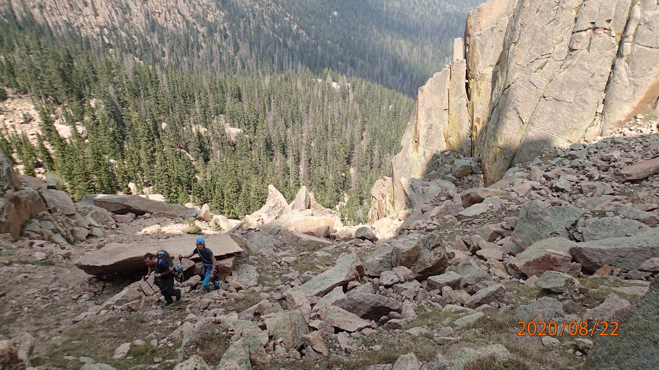 McKelvin and Negley approaching the base of The Flame after the soul crushing hike from Arching Jams (5.10+, 500'). [Photo] McKelvin/Negley collection