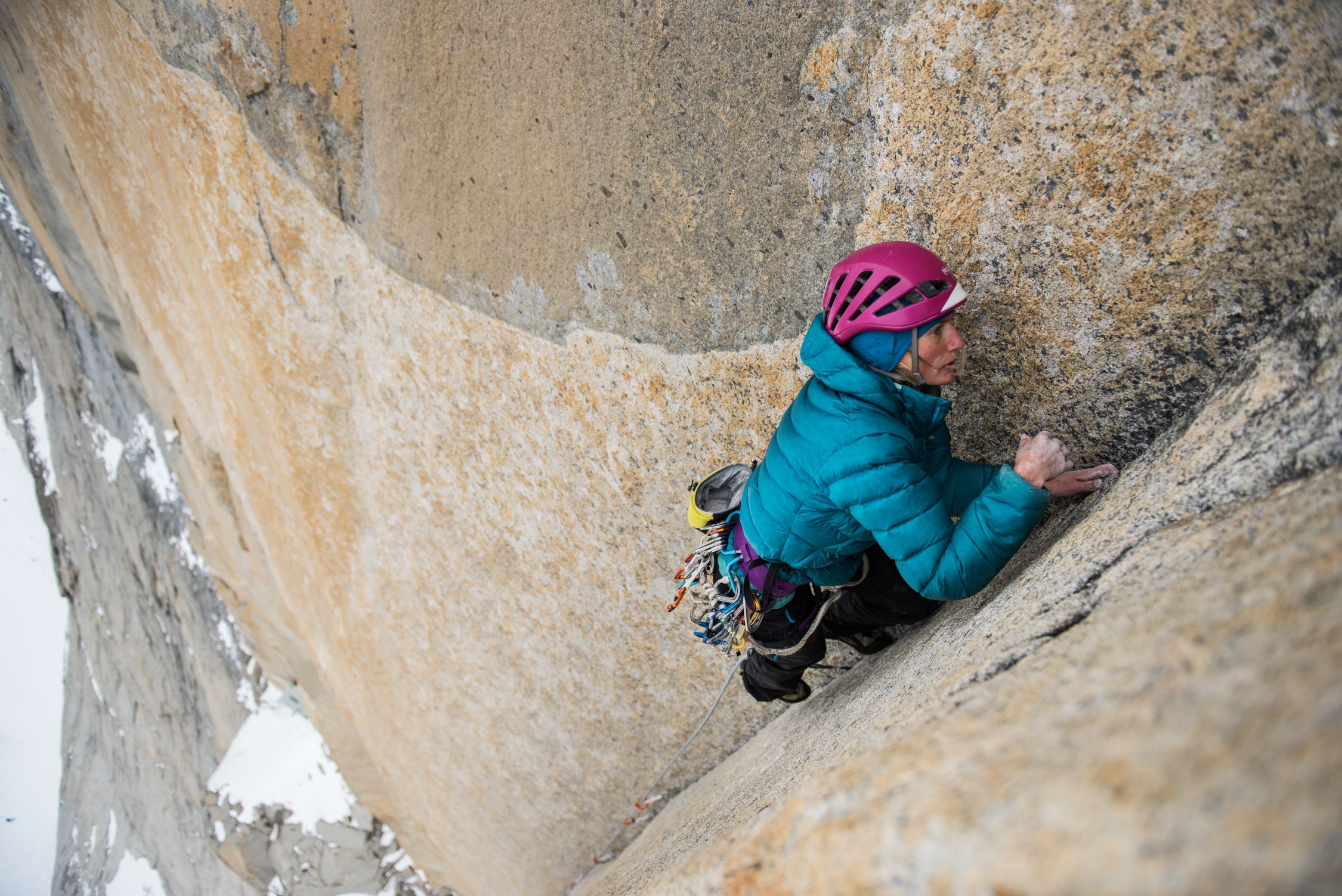 Brette Harrington leads a cold pitch on Riders on the Storm (VI 5.12d/5.13 A3, 1300m), Torre Central, Torres del Paine, Patagonia. [Photo] Drew Smith