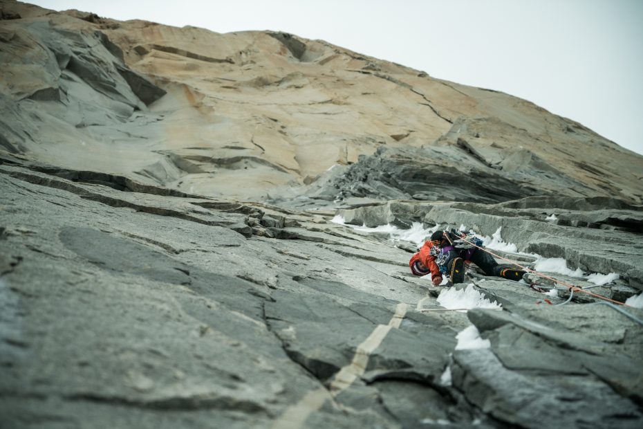 Brette Harrington leads an offwidth choked with ice and sugar snow in the vicinity of Pitch 9 on Riders on the Storm (VI 5.12d/5.13 A3, 1300m), Torre Central, Torres del Paine, Patagonia. She used a variety of tricks to make progress, including aid moves off her ice axes. [Photo] Drew Smith