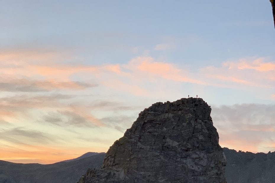 Alex Honnold and Tommy Caldwell can be seen standing on the summit of the Sharkstooth (12,630') in Rocky Mountain National Park at sunrise on Saturday, July 18, during their Continental Divide Ultimate Linkup (CDUL). [Photo] Adam Stack