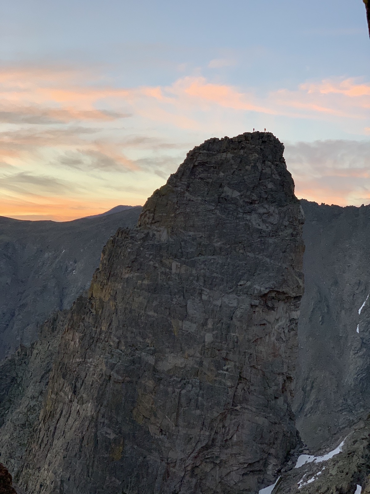 Alex Honnold and Tommy Caldwell can be seen standing on the summit of the Sharkstooth (12,630') in Rocky Mountain National Park at sunrise on Saturday, July 18, during their Continental Divide Ultimate Linkup (CDUL). [Photo] Adam Stack