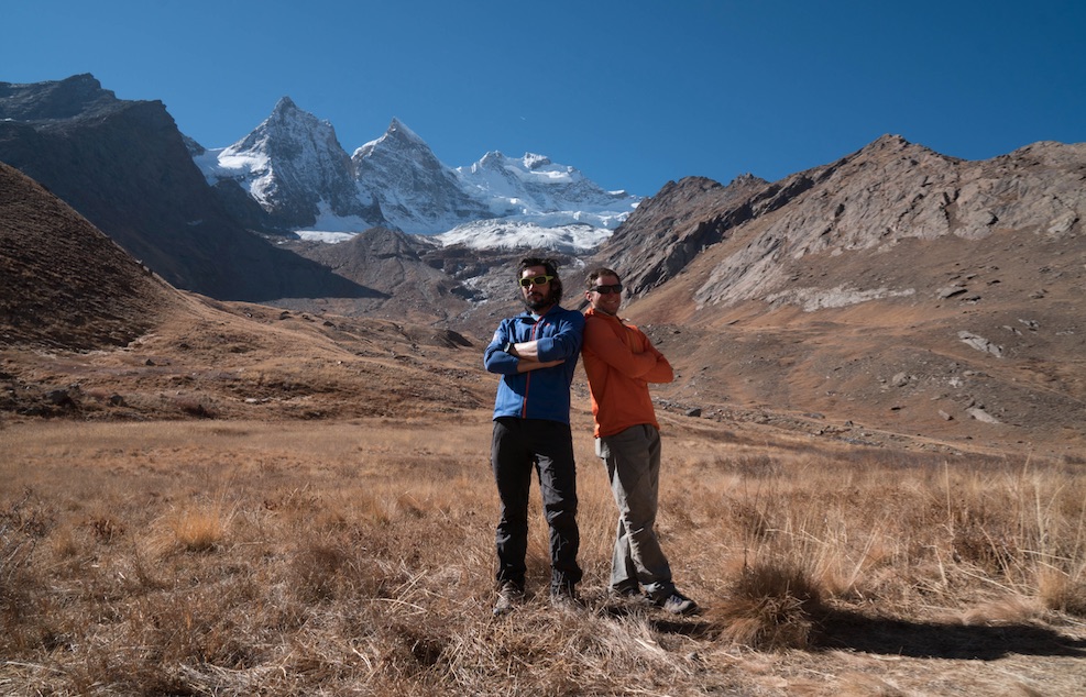 Villanueva (left) and Rousseau at base camp. Rungofarka is the center peak in the background. [Photo] Tino Villanueva