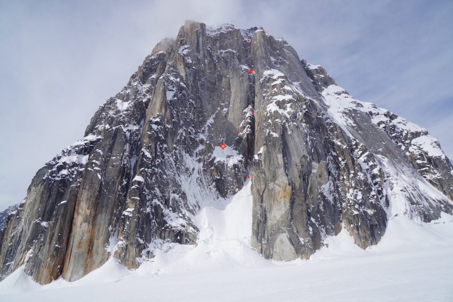 The two red stars indicate the bivy locations and the smaller red dots mark the approximate line of Ruth Gorge Grinder (AI6+ M7, 5,000') on the east face of Mt. Dickey. [Photo] Alan Rousseau