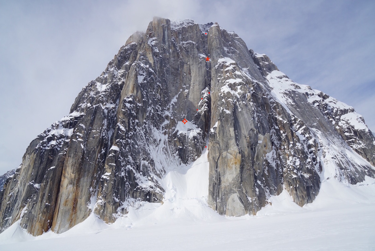 The two red stars indicate the bivy locations and the smaller red dots mark the approximate line of Ruth Gorge Grinder (AI6+ M7, 5,000') on the east face of Mt. Dickey. [Photo] Alan Rousseau