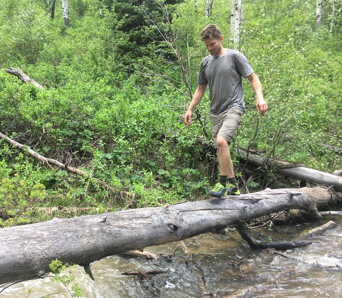 The author appreciating the sticky rubber of the Salewa Wildfire Edge approach shoes during a log crossing on a backpack trip in western Colorado last June. [Photo] Mandi Franz