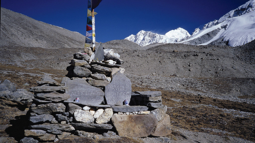 A stone memorial bench to Lowe and Bridges at the Shishapangma base camp. [Photo] Andrew McLean