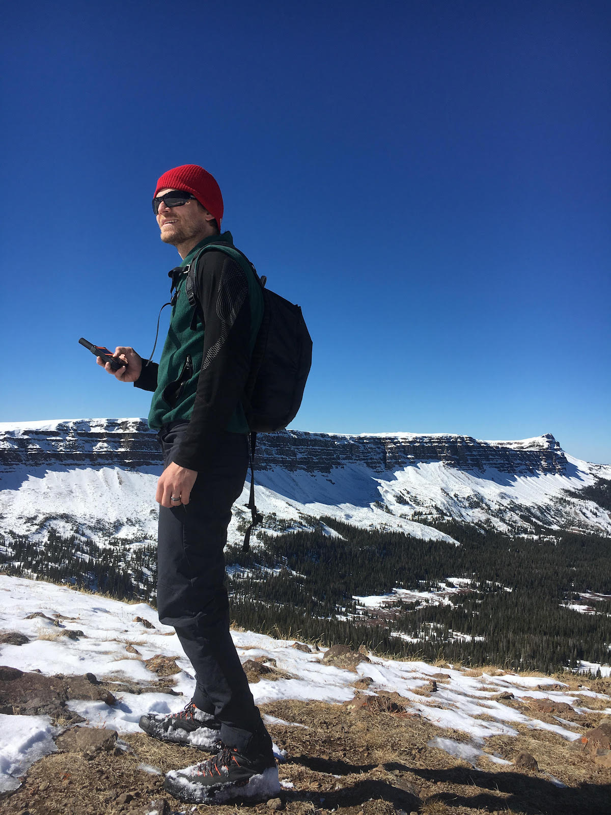 Derek Franz gets his bearings using the SPOT X 2-Way Satellite Messenger in Colorado's Flat Tops Wilderness in late October 2018. [Photo] Mandi Franz
