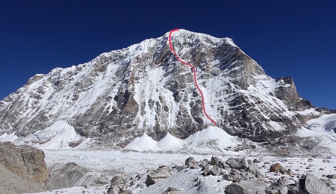 The west face of Tengi Ragi Tau (6938m) with Release the Kraken (AI5 M5+, 1600m) drawn in red. [Photo] Alan Rousseau