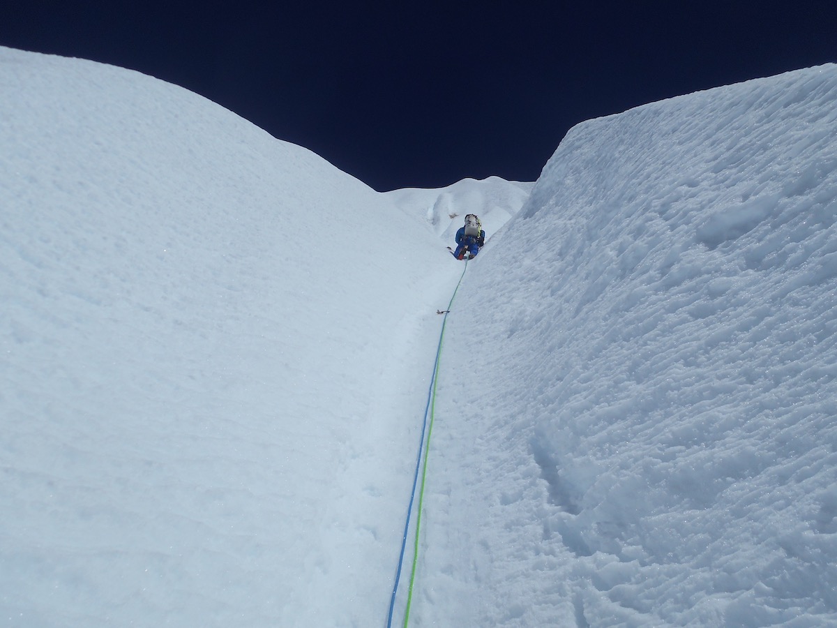 Villanueva leading in the long stretch of snow above the technical crux. [Photo] Alan Rousseau