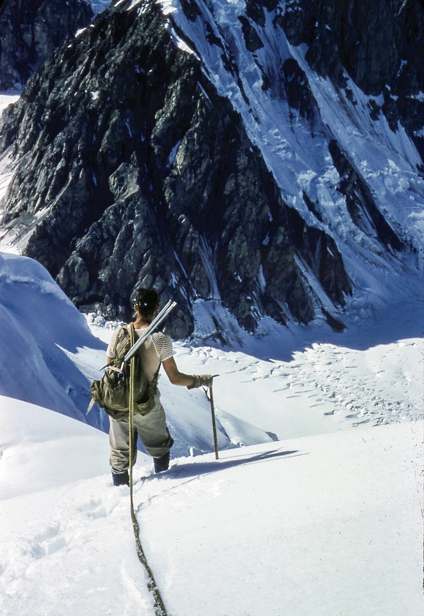 John Rupley, descending from a 1957 attempt on the northwest ridge of Mt. Huntington (12,240'), Alaska, with Hornbein and others. [Photo] Hornbein collection