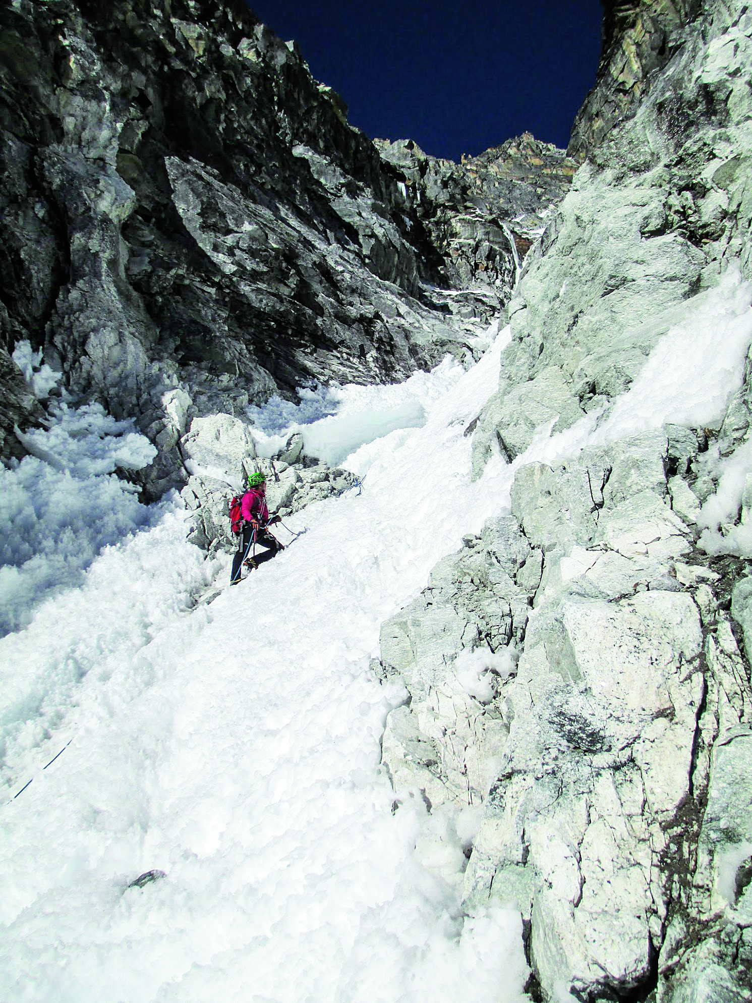 Anna Pfaff leads up the couloir on Lungaretse, Marlung Valley, Nepal. [Photo] Camilo Lopez