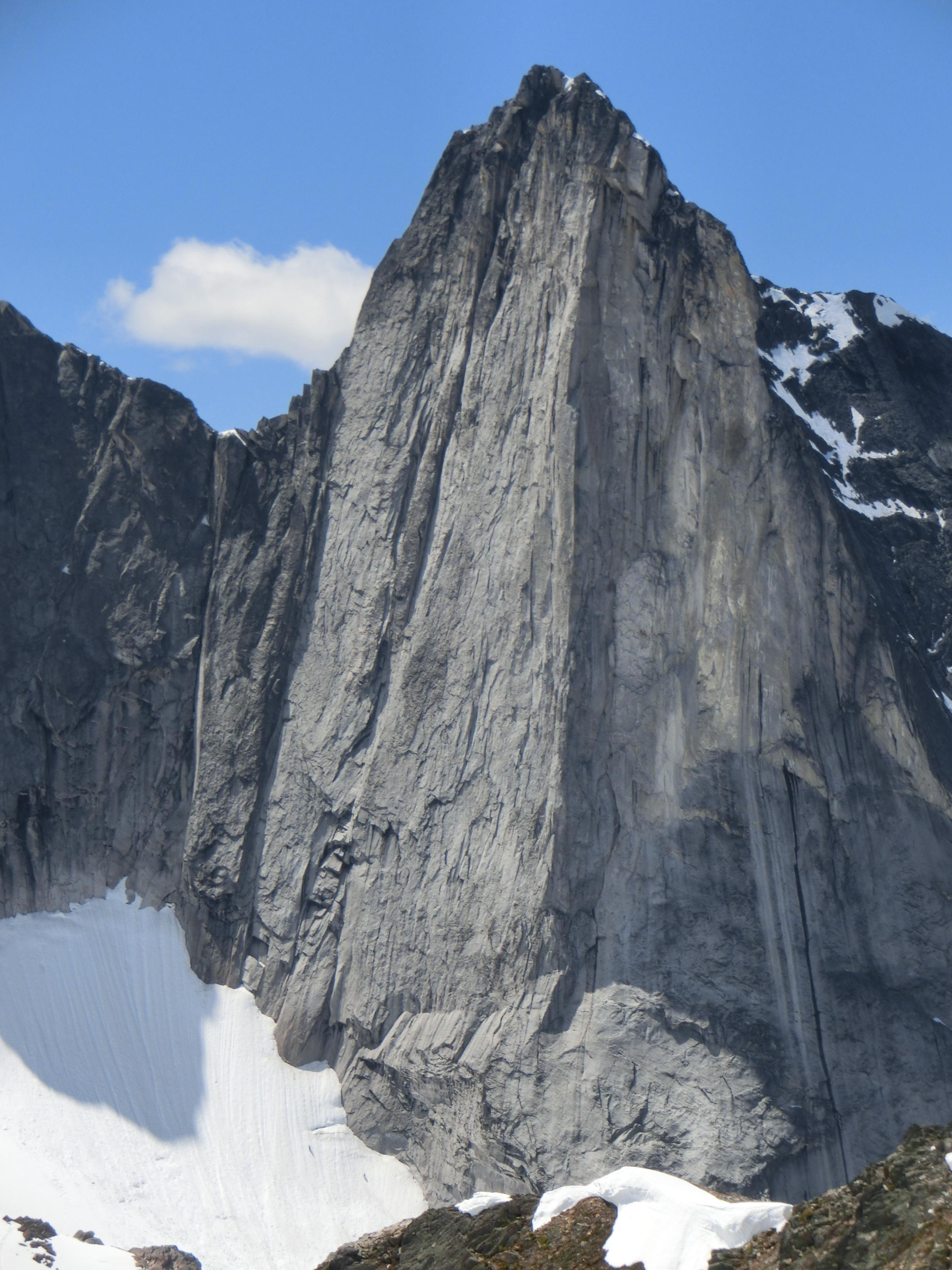 Wall Tower as viewed from the north shoulder of Hall Peak. The group climbed a line just left of the prominent arete in the center of the frame. [Photo] Kale Semar
