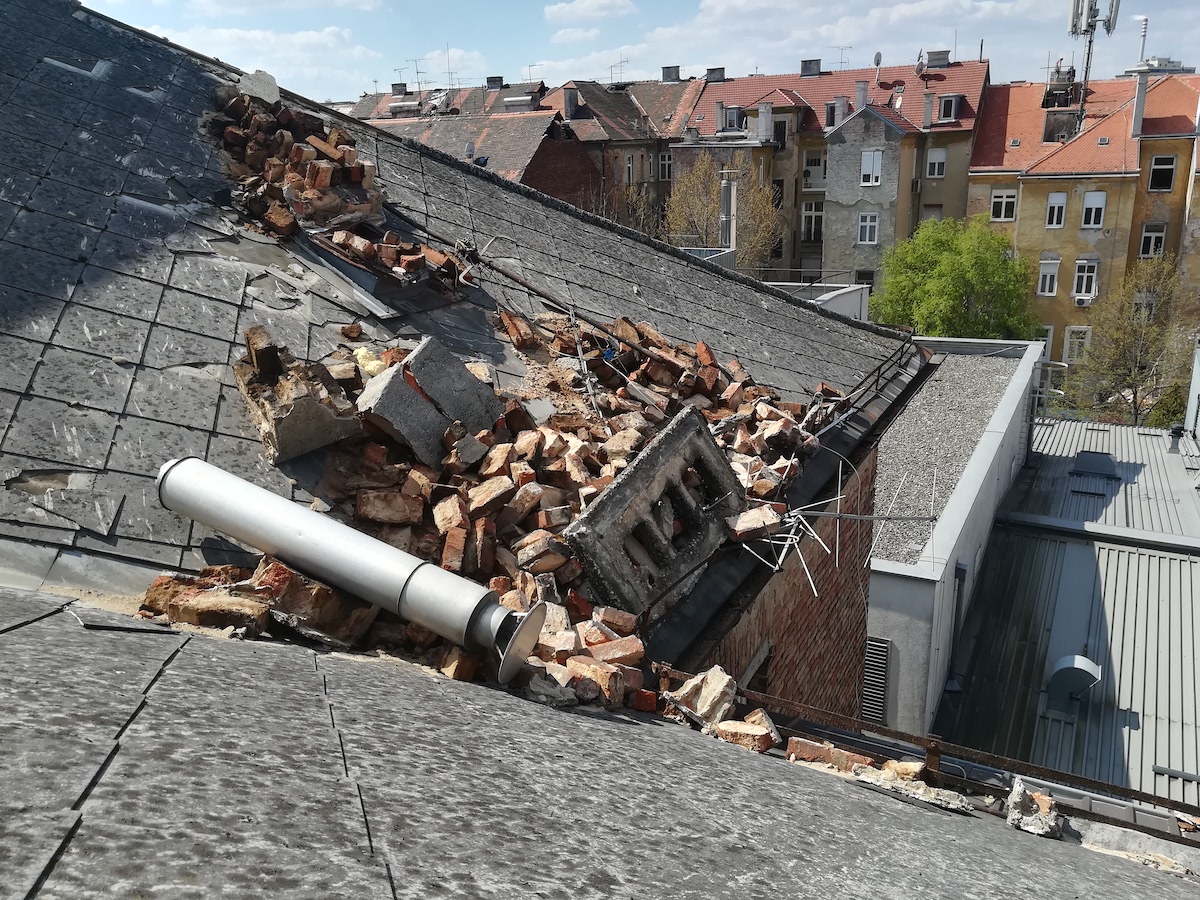 The rooftop rubble of a chimney that was toppled during the earthquake. [Photo] Vanja Siljak